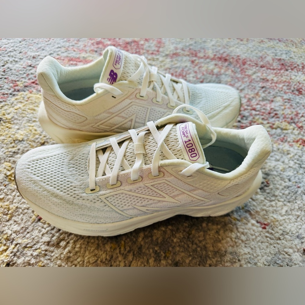 New Balance White Athletic Running Shoes. Color: seafoam/purple fading.